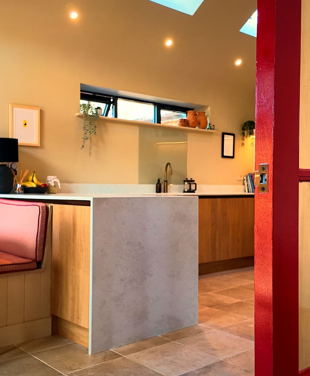 Glazed internal doors opening onto a kitchen