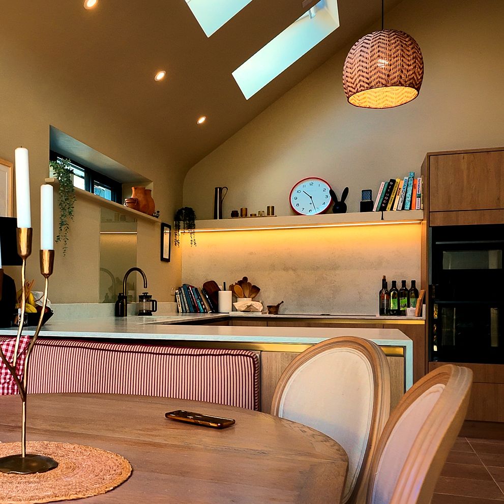 Open-plan kitchen and dining area with rooflights